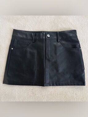 Edikted Black Faux Leather Mini Skirt with Front Pockets